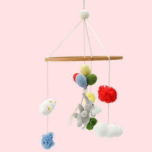 Nursery Mobile crib hanging with elephant, clouds and pom poms